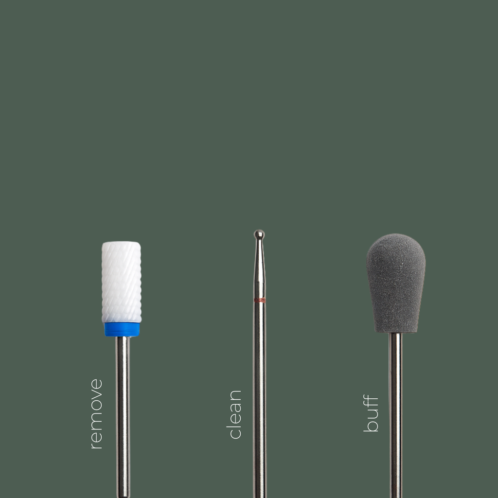 Three interchangeable attachments (bits) for the Pōdex® EDGE Professional Electric Nail File: REMOVE for removing gel and reducing nail thickness, CLEAN for cleaning beneath the nail and around the cuticle, and BUFF for restoring the natural nail surface after treatment.